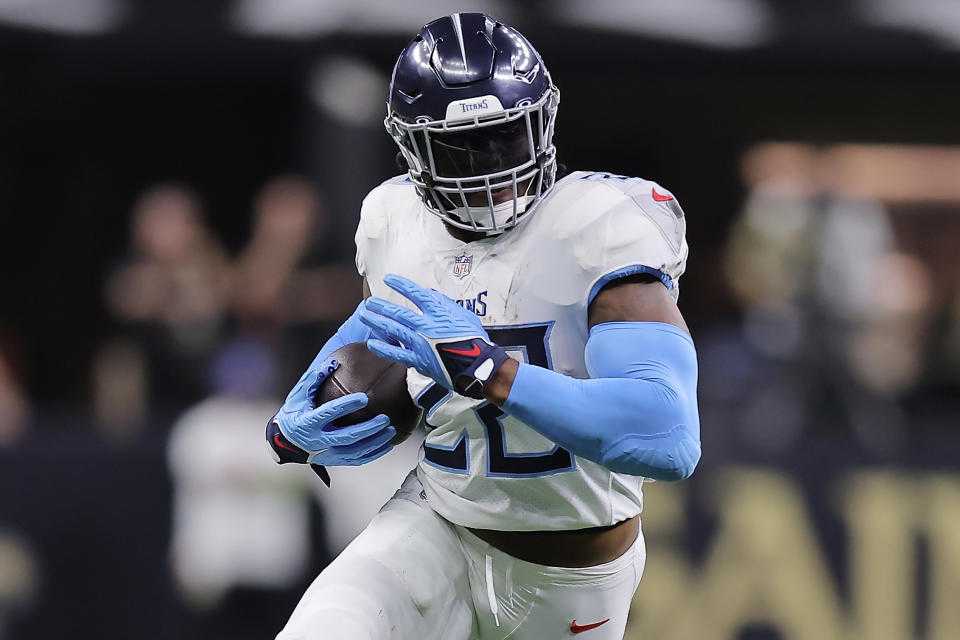 Derrick Henry of the Tennessee Titans runs the ball against the New Orleans Saints on Sept. 10. (Jonathan Bachman/Getty Images)